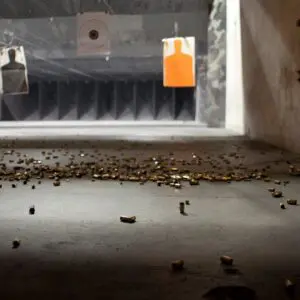 A lot of bullet shells on the floor in a target practice